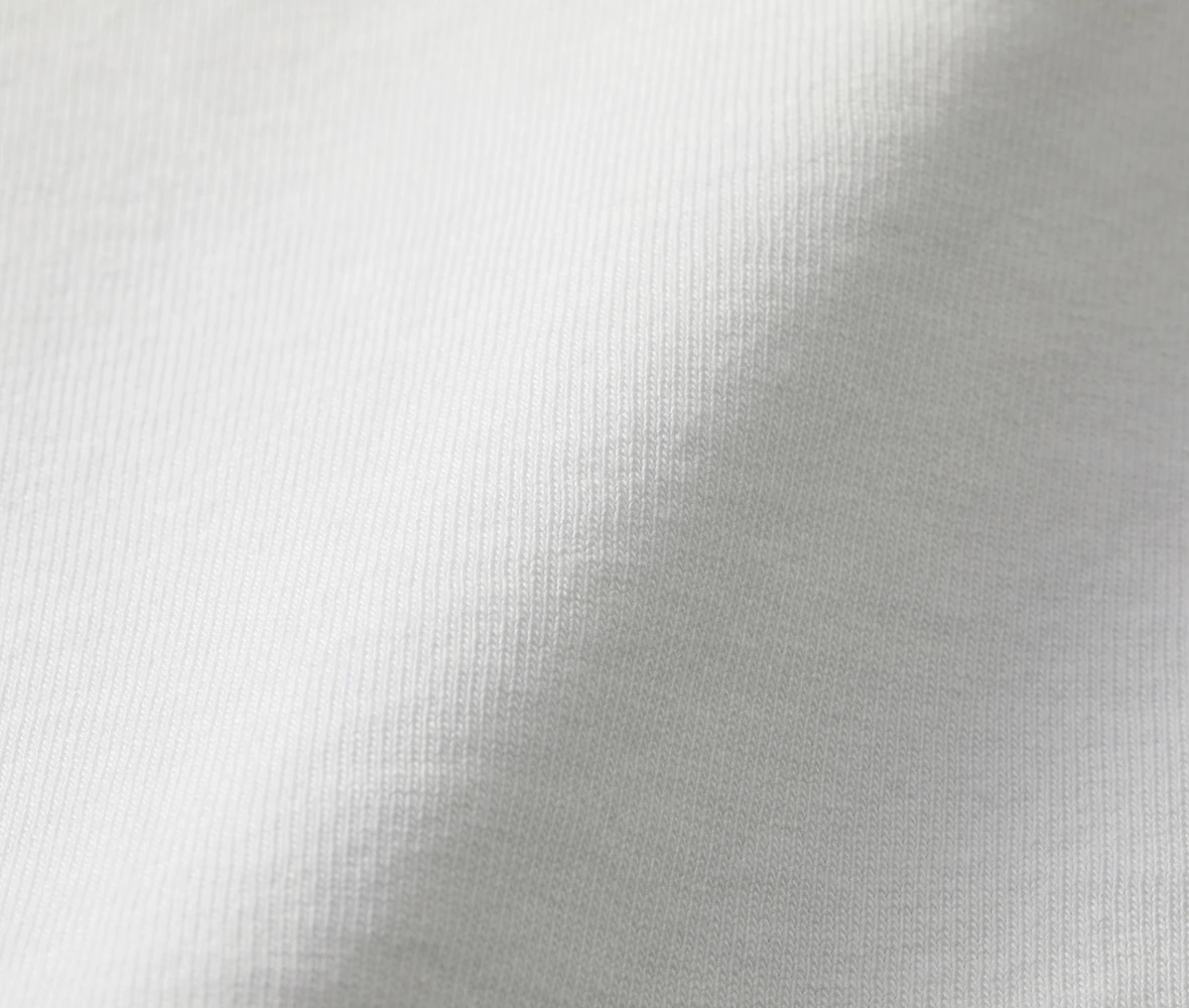 オープンエンド糸でシャリ感のある生地